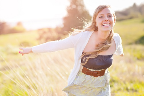 girl-happy-field-run-sun-large