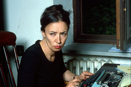 The journalist and authoress Oriana Fallaci, first Italian woman to work as special correspondent from war zones, is working at her typewriter, thoughtful, in the study of her property in Lamole, placed in the hills of Chianti. Greve in Chianti (Florence), June 1979. (Photo by Angelo Cozzi/Mondadori Portfolio via Getty Images)